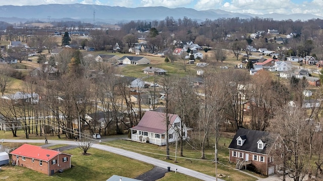 aerial view featuring a mountain view and a residential view