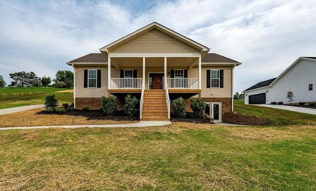 679 Hillman Hwy, Glade Spring, VA 24340 - view of front of house with brick siding, stairway, a front lawn, and a garage
