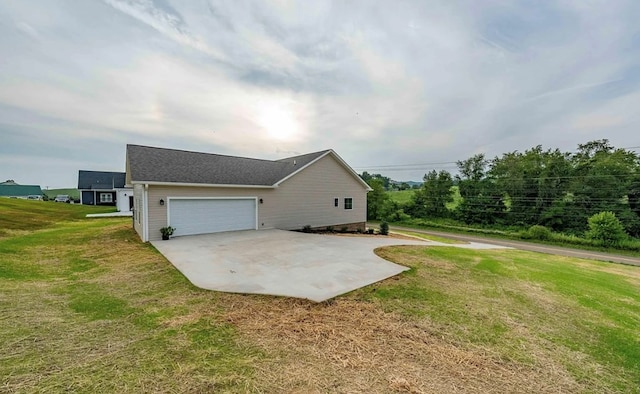 679 Hillman Hwy, Glade Spring, VA 24340 - view of side of home featuring a yard, concrete driveway, and an attached garage