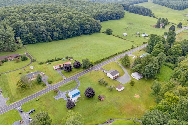 birds eye view of property featuring a rural view