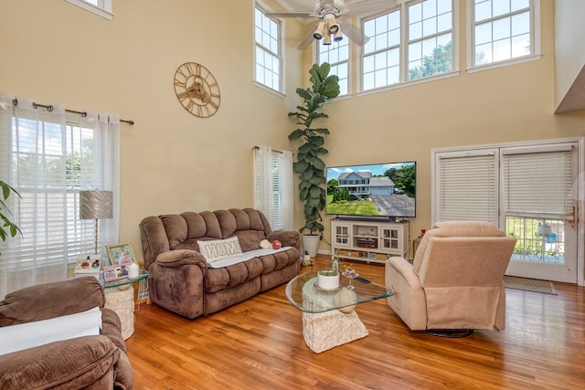 17031 Sedona Dr, Abingdon, VA 24211 - living area featuring a towering ceiling, wood finished floors, and ceiling fan