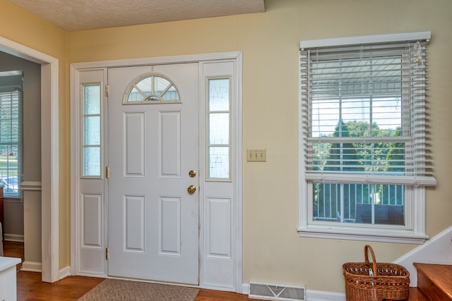 17031 Sedona Dr, Abingdon, VA 24211 - entryway with wood finished floors and baseboards