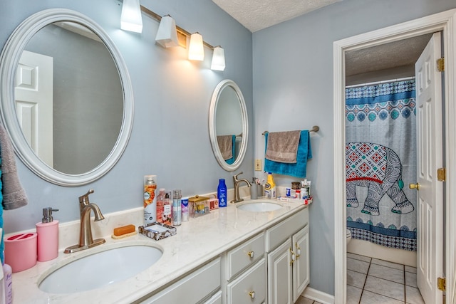 17031 Sedona Dr, Abingdon, VA 24211 - bathroom with double vanity, tile patterned floors, a textured ceiling, and a shower with curtain