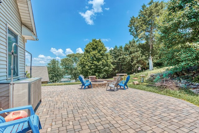 17031 Sedona Dr, Abingdon, VA 24211 - view of patio / terrace with a fire pit
