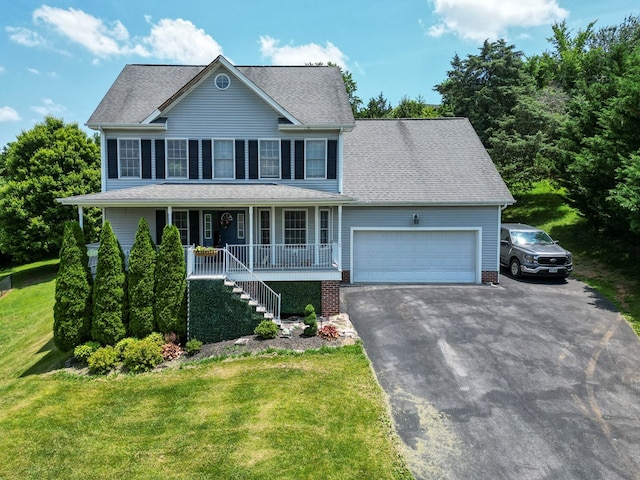 17031 Sedona Dr, Abingdon, VA 24211 - colonial inspired home with a porch, an attached garage, a front yard, stairs, and driveway