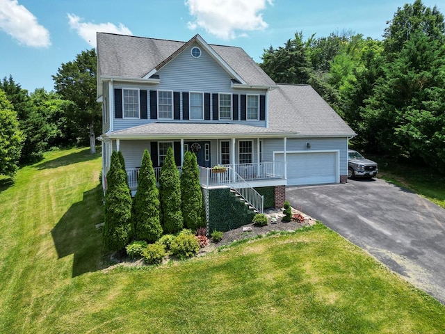 17031 Sedona Dr, Abingdon, VA 24211 - colonial home with asphalt driveway, covered porch, an attached garage, a front lawn, and stairway