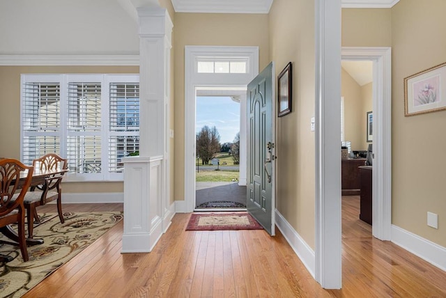 20324 Josh Allen Dr, Abingdon, VA 24211 - entryway featuring light wood-style floors, ornate columns, and crown molding