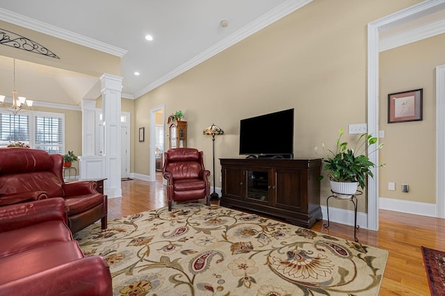 20324 Josh Allen Dr, Abingdon, VA 24211 - living area with wood finished floors, a chandelier, crown molding, recessed lighting, and ornate columns