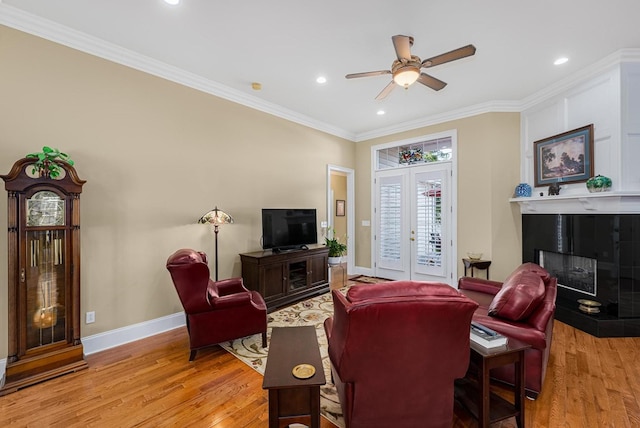 20324 Josh Allen Dr, Abingdon, VA 24211 - living room with a fireplace, ceiling fan, light wood-style flooring, crown molding, and recessed lighting