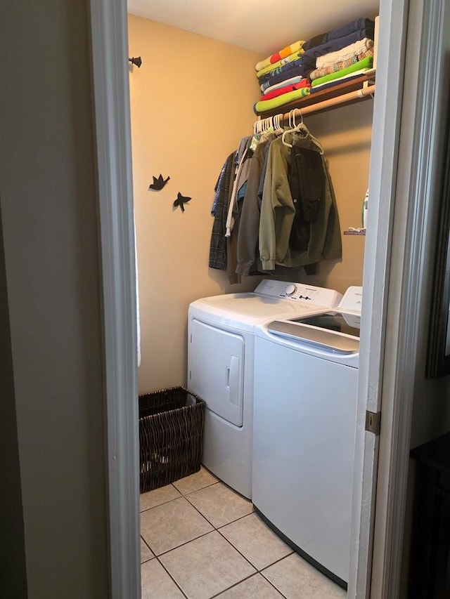 1317 Newton St, Bristol, VA 24201 - laundry room with washing machine and dryer and light tile patterned flooring