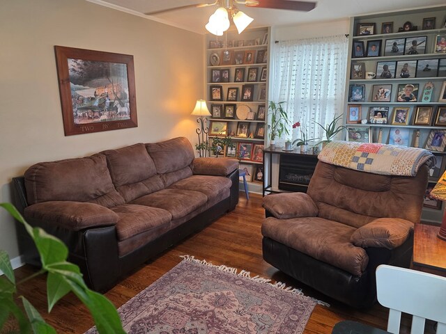 1317 Newton St, Bristol, VA 24201 - living room with ceiling fan, wood finished floors, and built in shelves