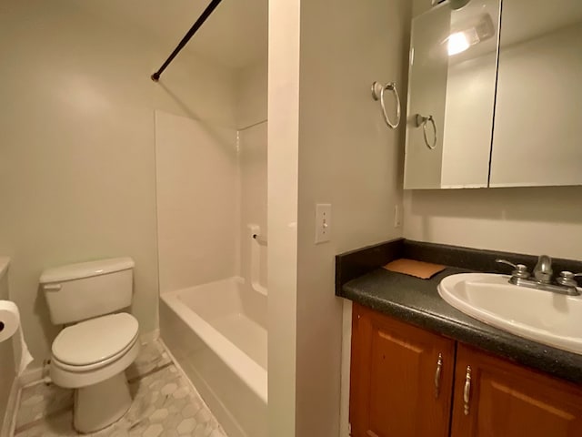 full bathroom with tile patterned floors, toilet, and vanity