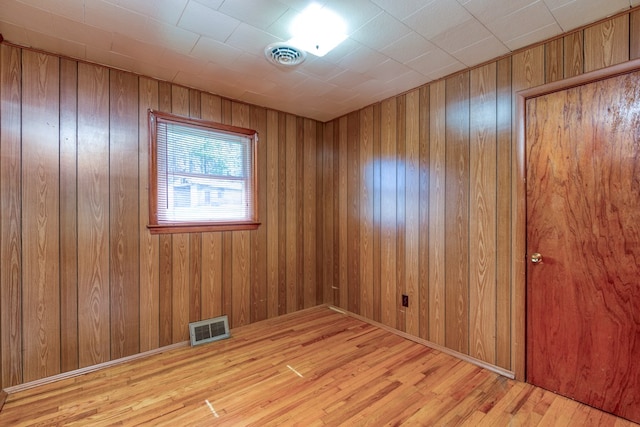 324 Mill Creek Rd, Chilhowie, VA 24319 - unfurnished room with visible vents, wood finished floors, and wooden walls