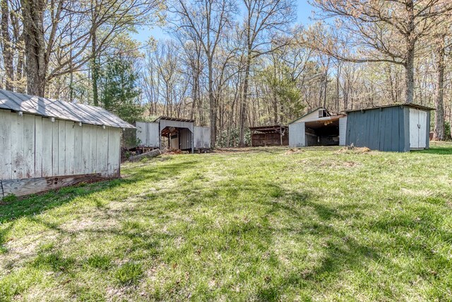 324 Mill Creek Rd, Chilhowie, VA 24319 - view of yard with a storage unit, an outdoor structure, and a pole building