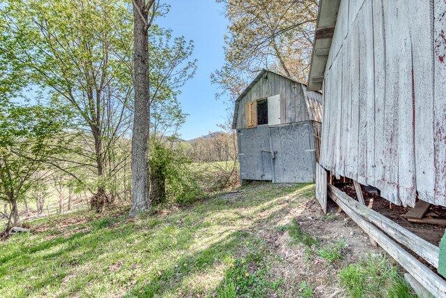324 Mill Creek Rd, Chilhowie, VA 24319 - view of yard featuring a barn and an outbuilding