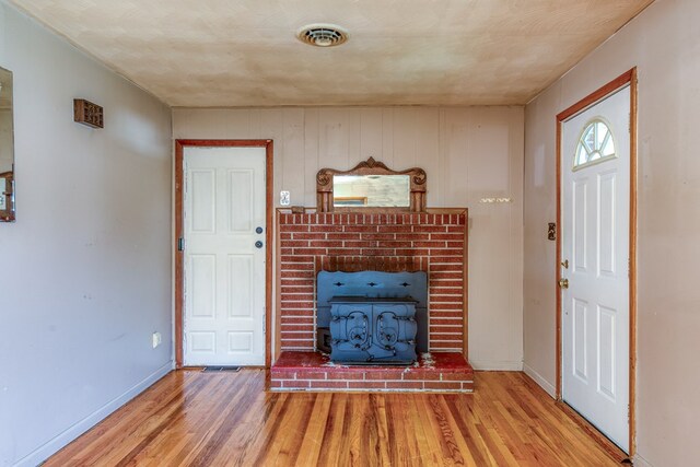 324 Mill Creek Rd, Chilhowie, VA 24319 - foyer featuring a fireplace, visible vents, baseboards, and light wood-type flooring