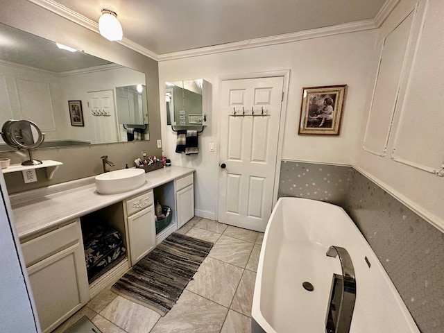 bathroom with crown molding and vanity