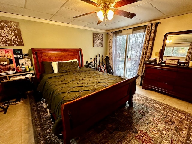 bedroom featuring ceiling fan, crown molding, and access to outside