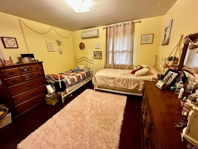 bedroom featuring an AC wall unit