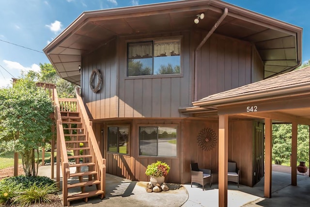 rear view of house with a patio