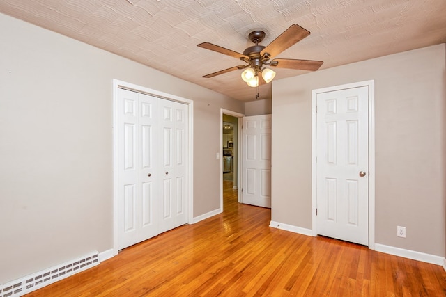 583 Fowler St, Marion, VA 24354 - unfurnished bedroom with light wood-type flooring, a closet, and ceiling fan