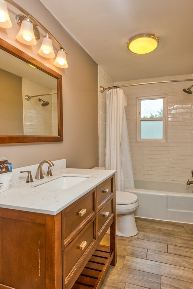 583 Fowler St, Marion, VA 24354 - bathroom featuring vanity, shower / tub combo with curtain, and wood finished floors