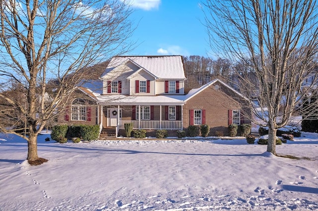 view of property featuring covered porch