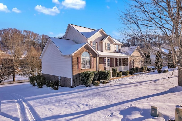 view of snow covered property