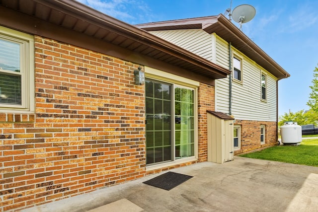 17395 Ashley Hill Cir, Abingdon, VA 24211 - view of property exterior with a patio and brick siding