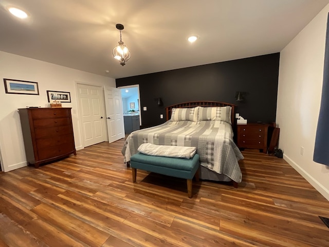 bedroom featuring recessed lighting, baseboards, and wood finished floors