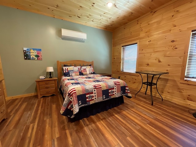 bedroom with wooden walls, a wall mounted air conditioner, baseboards, wood finished floors, and wood ceiling