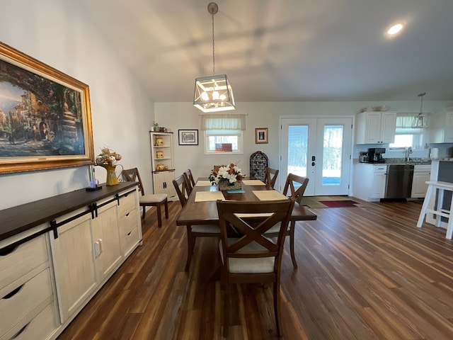 dining room with recessed lighting, a chandelier, dark wood-style floors, and french doors