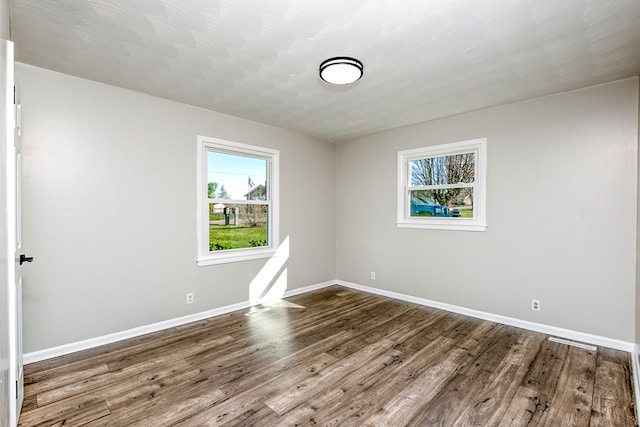 824 Skyview Dr, Chilhowie, VA 24319 - spare room with wood finished floors and baseboards