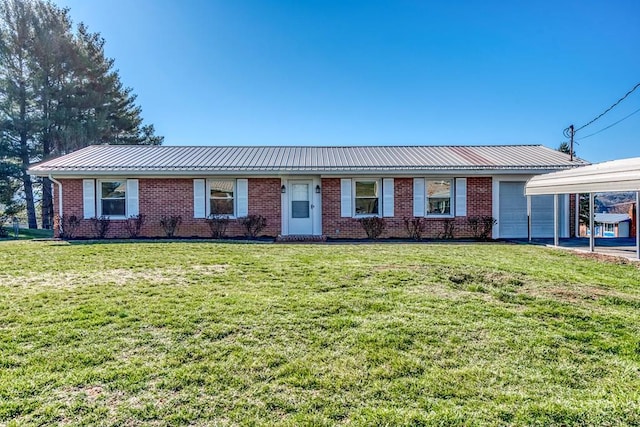 824 Skyview Dr, Chilhowie, VA 24319 - ranch-style home with a front lawn, metal roof, an attached garage, and brick siding