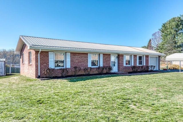 824 Skyview Dr, Chilhowie, VA 24319 - ranch-style home featuring a front lawn, a garage, metal roof, brick siding, and fence