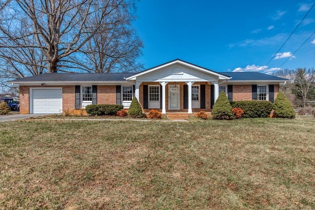 867 NE Wayne Ave, Abingdon, VA 24210 - single story home with a porch, an attached garage, a metal roof, brick siding, and a standing seam roof