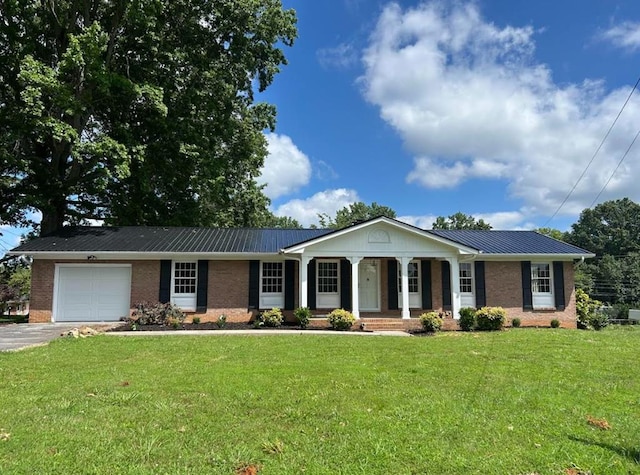 867 NE Wayne Ave, Abingdon, VA 24210 - view of front facade with brick siding, a porch, a garage, and a front yard