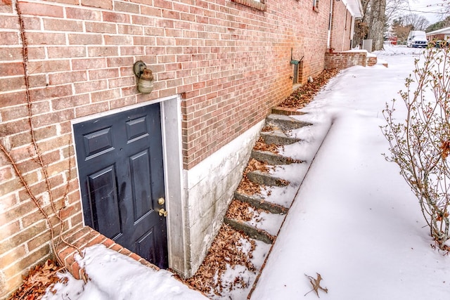 867 NE Wayne Ave, Abingdon, VA 24210 - snow covered property entrance with brick siding