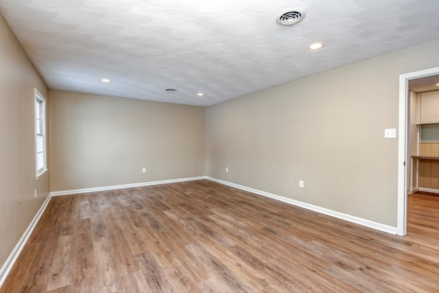 867 NE Wayne Ave, Abingdon, VA 24210 - spare room with light wood-type flooring and recessed lighting