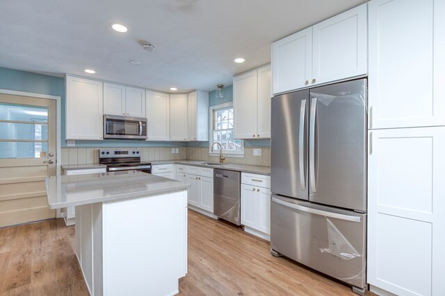 867 NE Wayne Ave, Abingdon, VA 24210 - kitchen with stainless steel appliances, white cabinetry, light countertops, and recessed lighting