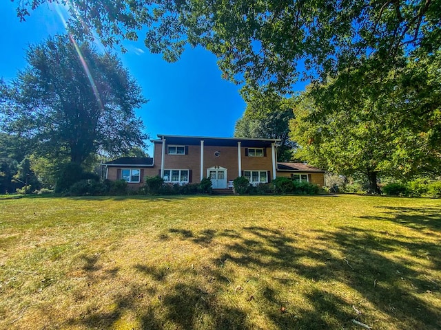 view of front of home with a front yard