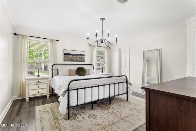10601 W River Vue, Biloxi, MS 39532 - bedroom featuring a chandelier, wood finished floors, multiple windows, and ornamental molding