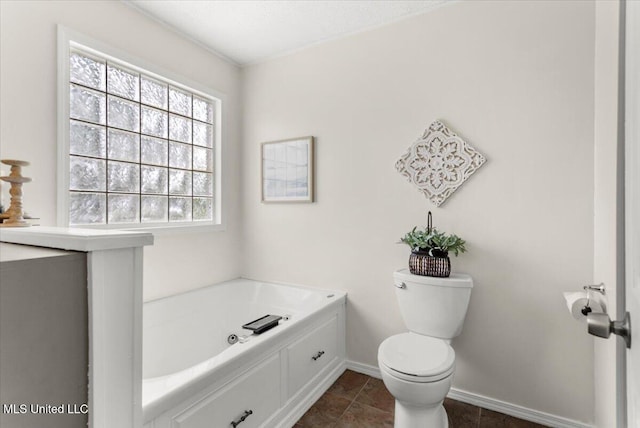 10601 W River Vue, Biloxi, MS 39532 - full bathroom featuring a whirlpool tub and toilet