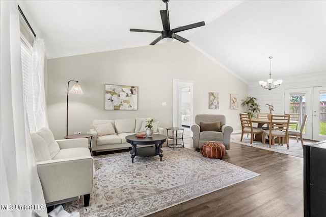 10601 W River Vue, Biloxi, MS 39532 - living area with wood finished floors, ceiling fan, lofted ceiling, and a chandelier