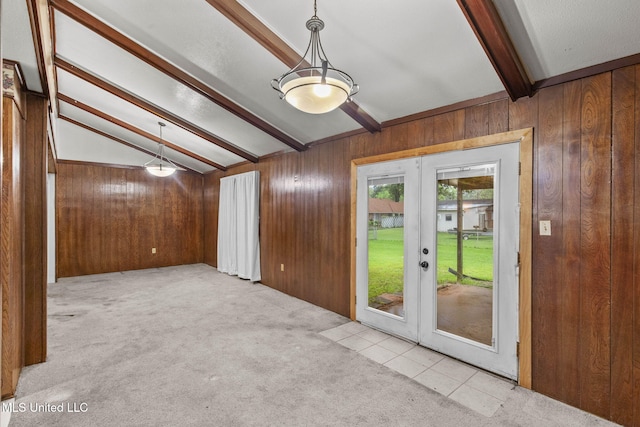 3608 Old Brandon Rd, Pearl, MS 39208 - carpeted empty room with french doors and wood walls