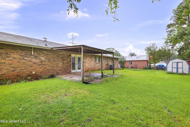 3608 Old Brandon Rd, Pearl, MS 39208 - view of green lawn featuring a patio area and french doors