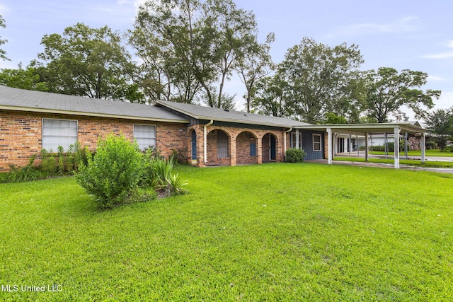 3608 Old Brandon Rd, Pearl, MS 39208 - ranch-style home with brick siding, a front lawn, and an attached carport