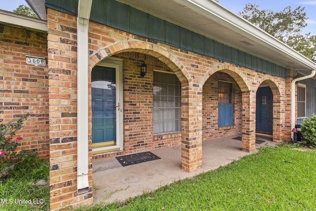 3608 Old Brandon Rd, Pearl, MS 39208 - entrance to property with brick siding and a patio