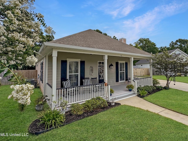 14 Le Petit Cv, Long Beach, MS 39560 - view of front of property with a porch, a chimney, and roof with shingles