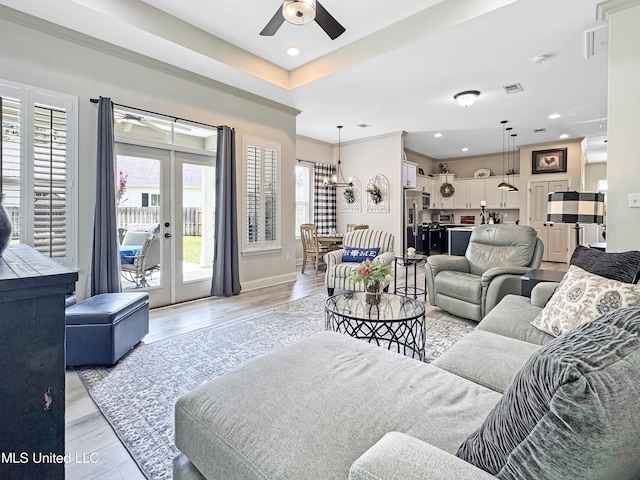 14 Le Petit Cv, Long Beach, MS 39560 - living room with ceiling fan, french doors, a chandelier, light wood finished floors, and recessed lighting